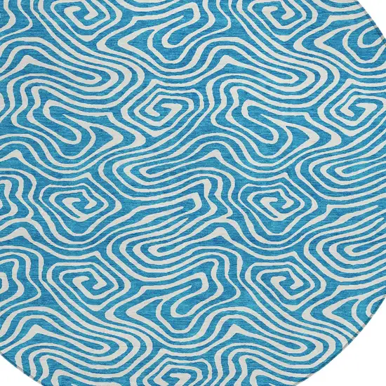 8' Teal Blue And Ivory Round Abstract Washable Indoor Outdoor Area Rug Photo 4