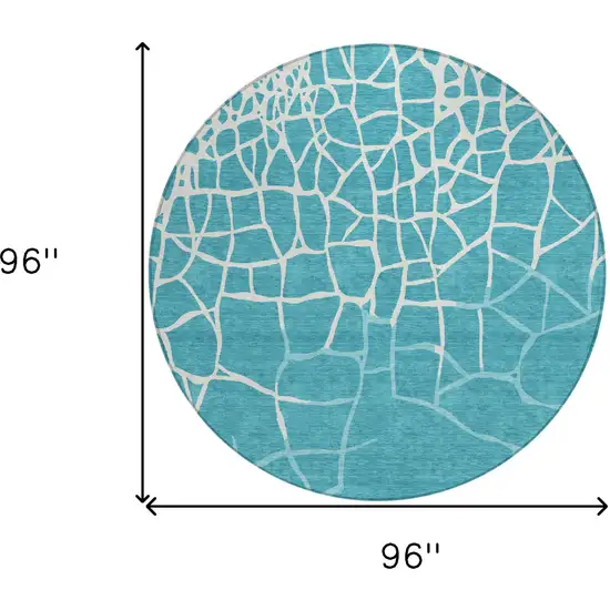 8' Teal Blue And Ivory Round Abstract Washable Indoor Outdoor Area Rug Photo 9