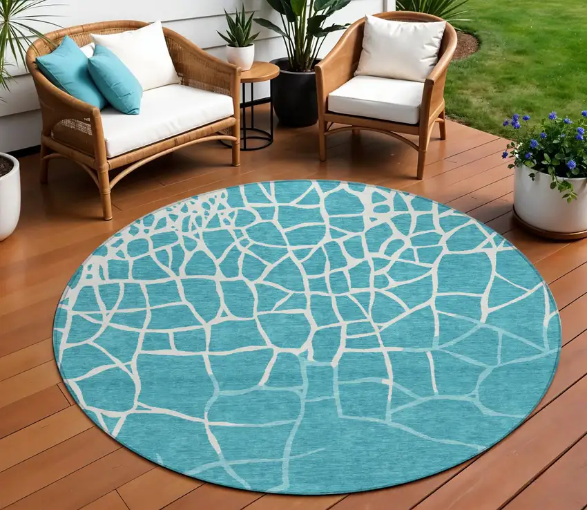 8' Teal Blue And Ivory Round Abstract Washable Indoor Outdoor Area Rug Photo 1