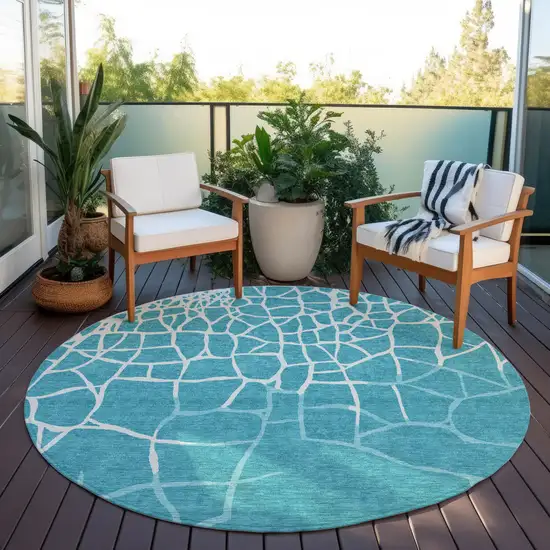 8' Teal Blue And Ivory Round Abstract Washable Indoor Outdoor Area Rug Photo 7