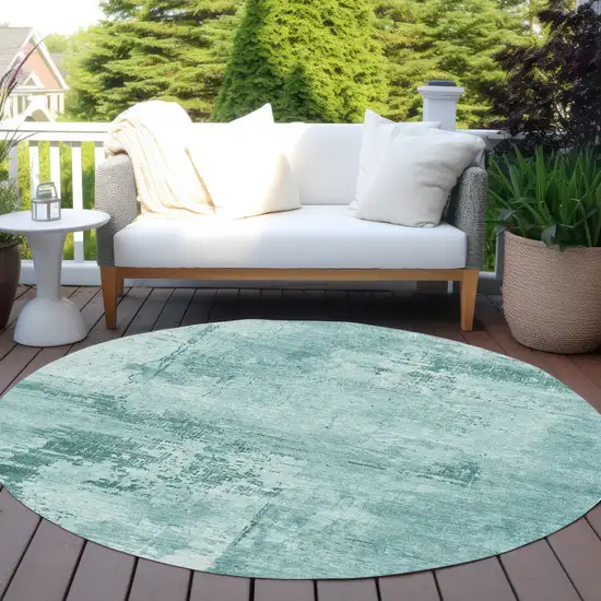 8' Teal Blue And Ivory Round Abstract Washable Indoor Outdoor Area Rug Photo 6