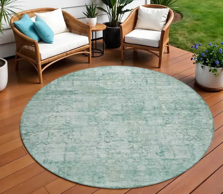 8' Teal Blue And Ivory Round Abstract Washable Indoor Outdoor Area Rug Photo 1