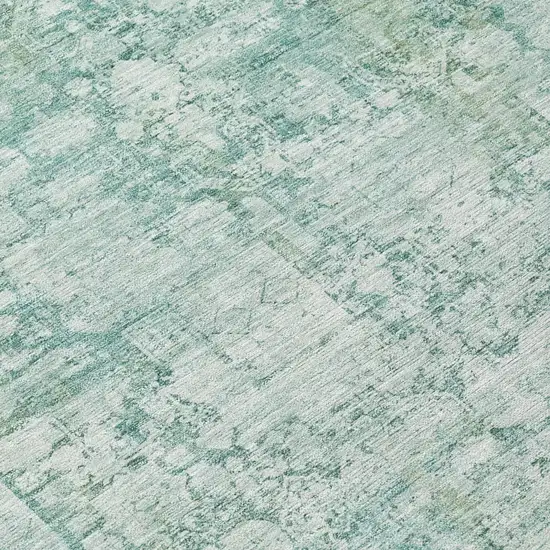 8' Teal Blue And Ivory Round Abstract Washable Indoor Outdoor Area Rug Photo 8