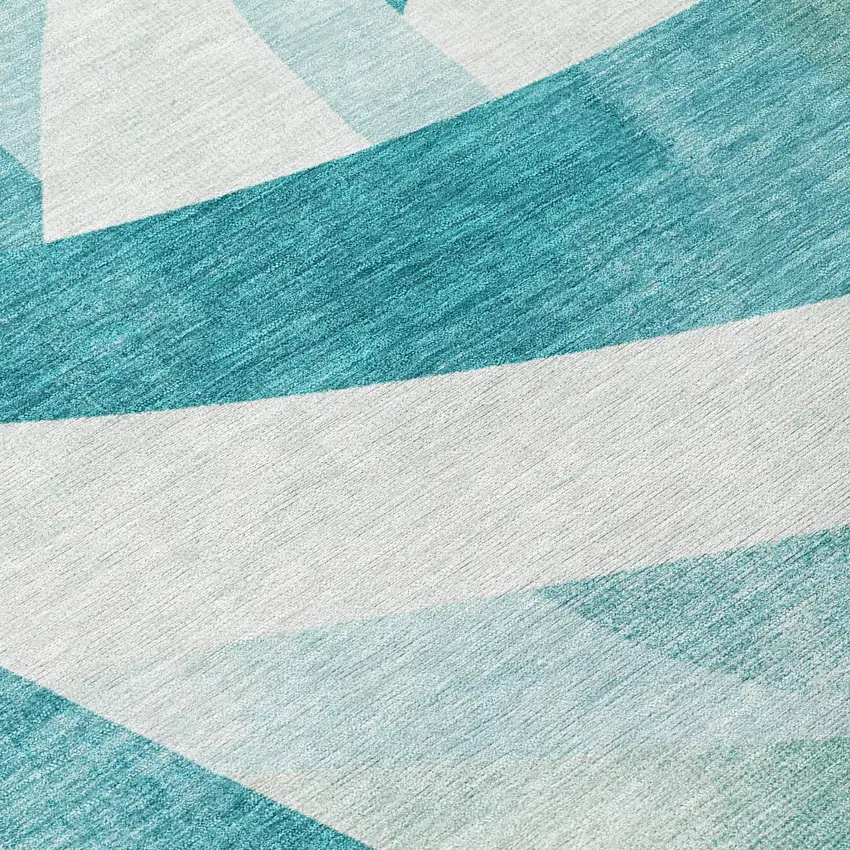 8' Teal Blue And Ivory Round Abstract Washable Indoor Outdoor Area Rug Photo 9