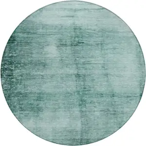 Photo of 8' Teal Blue And Ivory Round Abstract Washable Indoor Outdoor Area Rug