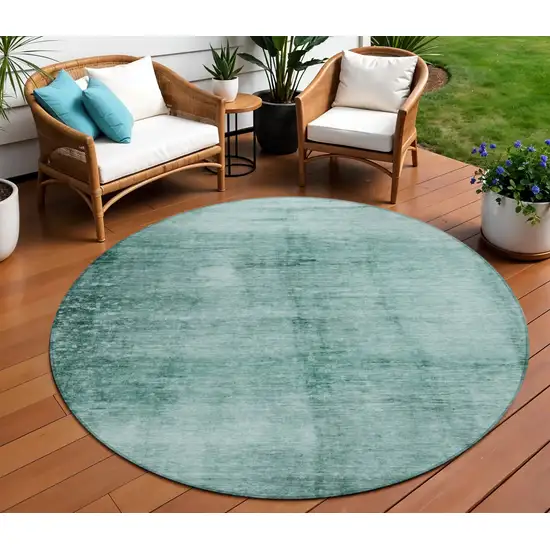 8' Teal Blue And Ivory Round Abstract Washable Indoor Outdoor Area Rug Photo 2