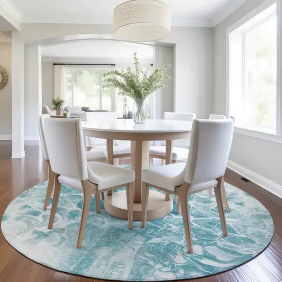 8' Teal Blue And Ivory Round Abstract Washable Indoor Outdoor Area Rug Photo 6