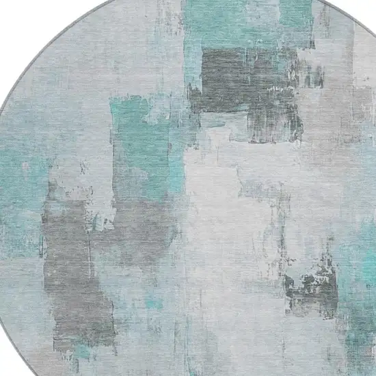 8' Teal Blue And Ivory Round Abstract Washable Indoor Outdoor Area Rug Photo 4