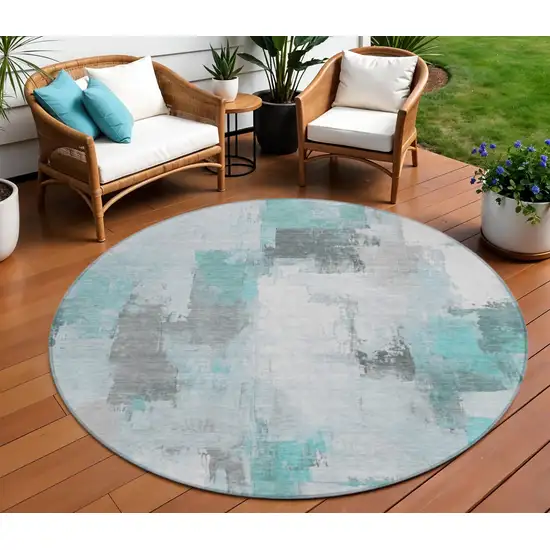 8' Teal Blue And Ivory Round Abstract Washable Indoor Outdoor Area Rug Photo 2
