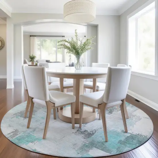 8' Teal Blue And Ivory Round Abstract Washable Indoor Outdoor Area Rug Photo 6