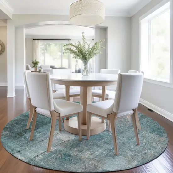 8' Teal Blue And Ivory Round Abstract Washable Indoor Outdoor Area Rug Photo 6