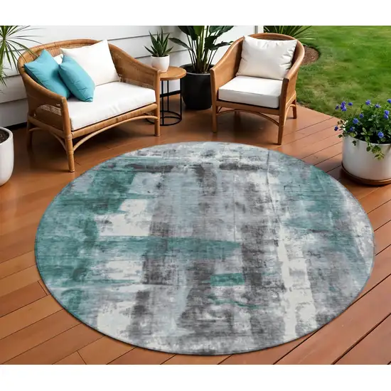 8' Teal Blue And Ivory Round Abstract Washable Indoor Outdoor Area Rug Photo 2