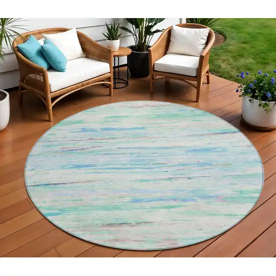 8' Teal Blue And Ivory Round Abstract Washable Indoor Outdoor Area Rug Photo 2