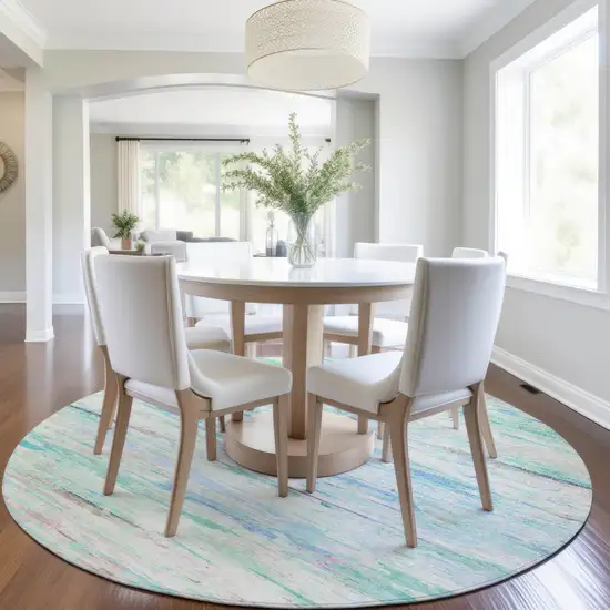 8' Teal Blue And Ivory Round Abstract Washable Indoor Outdoor Area Rug Photo 6
