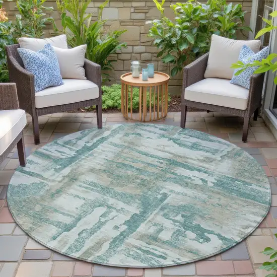 8' Teal Blue And Ivory Round Abstract Washable Indoor Outdoor Area Rug Photo 6