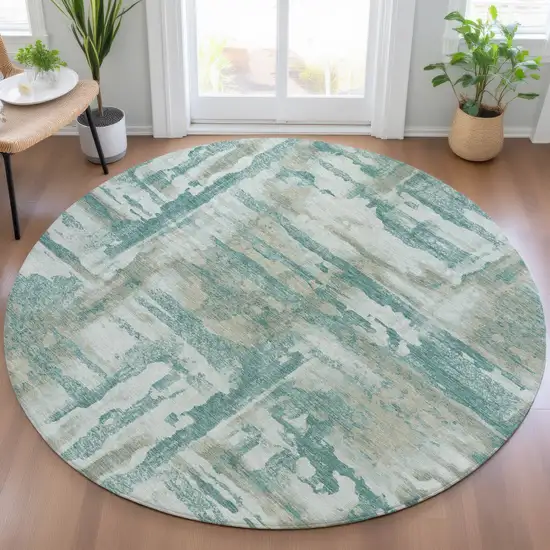 8' Teal Blue And Ivory Round Abstract Washable Indoor Outdoor Area Rug Photo 5