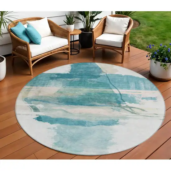 8' Teal Blue And Ivory Round Abstract Washable Indoor Outdoor Area Rug Photo 2