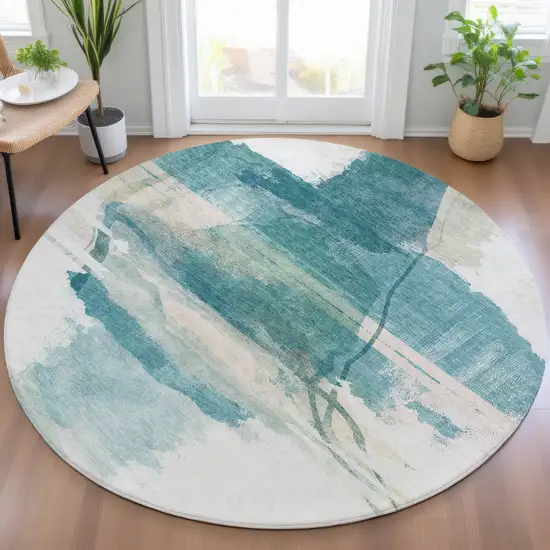 8' Teal Blue And Ivory Round Abstract Washable Indoor Outdoor Area Rug Photo 6