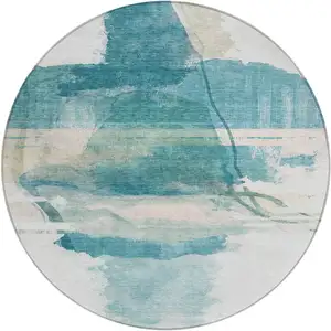 Photo of 8' Teal Blue And Ivory Round Abstract Washable Indoor Outdoor Area Rug