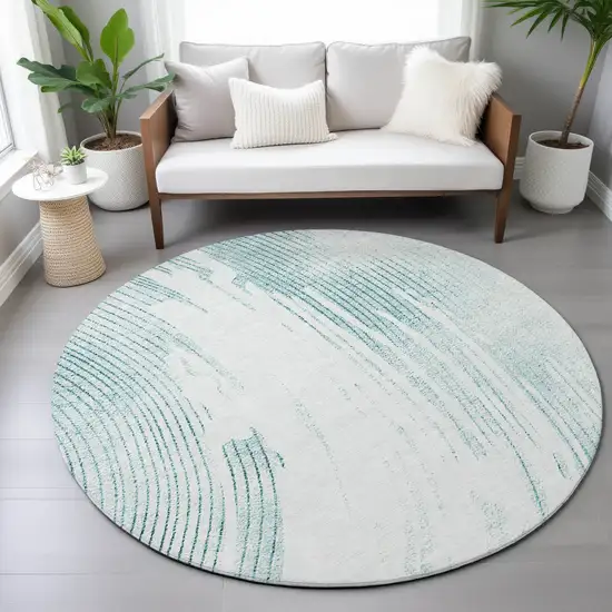 8' Teal Blue And Ivory Round Abstract Washable Indoor Outdoor Area Rug Photo 7