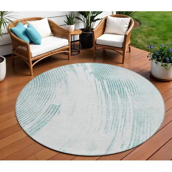 8' Teal Blue And Ivory Round Abstract Washable Indoor Outdoor Area Rug Photo 2