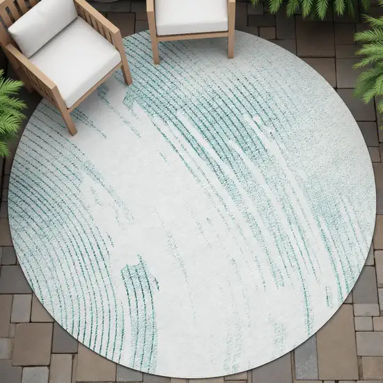 8' Teal Blue And Ivory Round Abstract Washable Indoor Outdoor Area Rug Photo 6