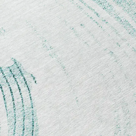 8' Teal Blue And Ivory Round Abstract Washable Indoor Outdoor Area Rug Photo 9