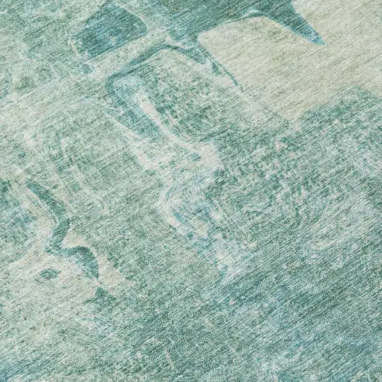 8' Teal Blue And Ivory Round Abstract Washable Indoor Outdoor Area Rug Photo 9