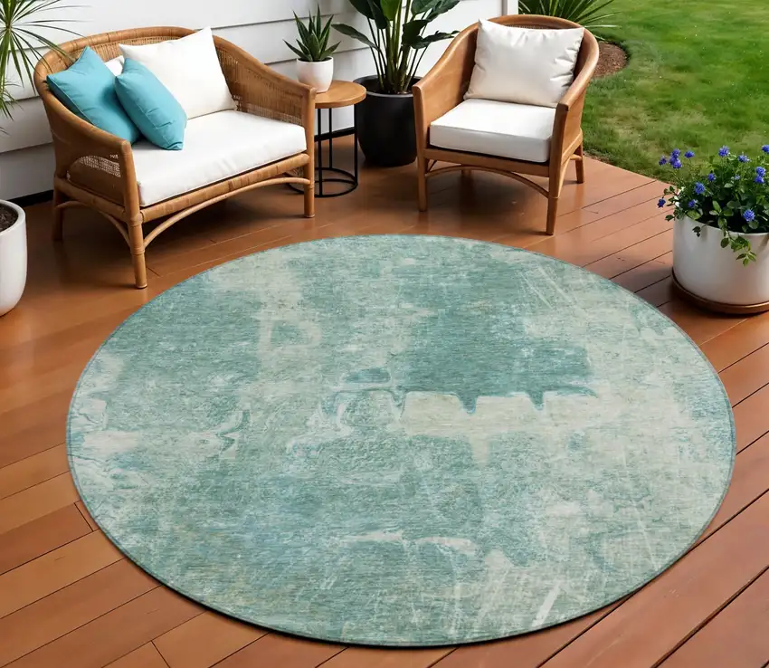 8' Teal Blue And Ivory Round Abstract Washable Indoor Outdoor Area Rug Photo 1