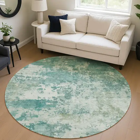 8' Teal Blue And Ivory Round Abstract Washable Indoor Outdoor Area Rug Photo 5