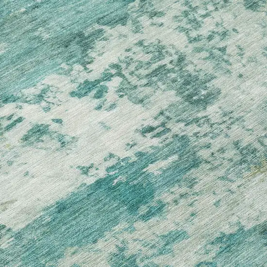 8' Teal Blue And Ivory Round Abstract Washable Indoor Outdoor Area Rug Photo 9