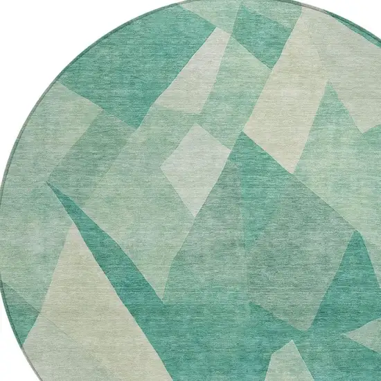 8' Teal Blue And Ivory Round Abstract Washable Indoor Outdoor Area Rug Photo 2