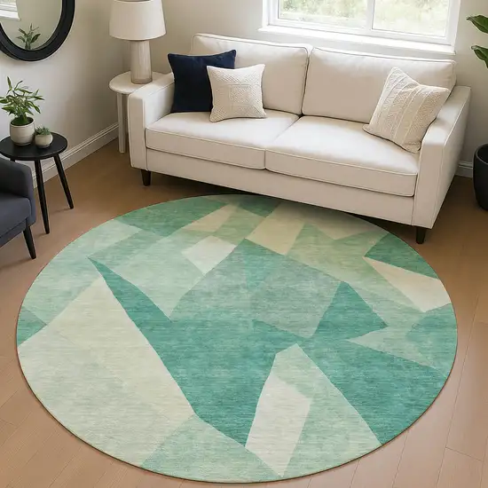8' Teal Blue And Ivory Round Abstract Washable Indoor Outdoor Area Rug Photo 5