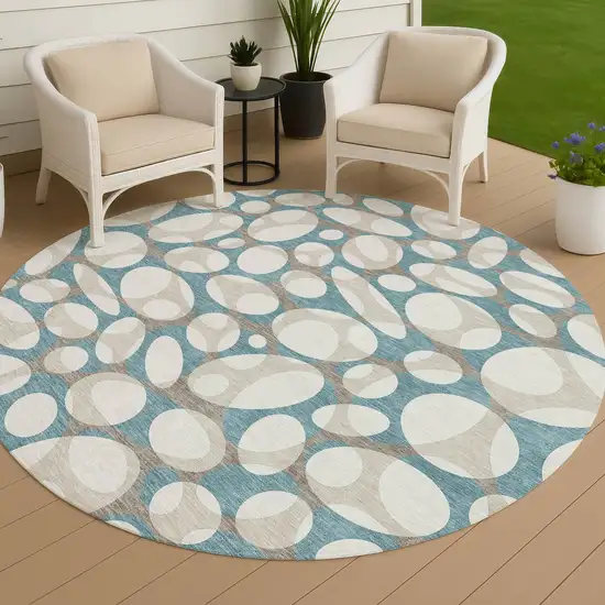 8' Teal Blue And Ivory Round Abstract Washable Indoor Outdoor Area Rug Photo 4