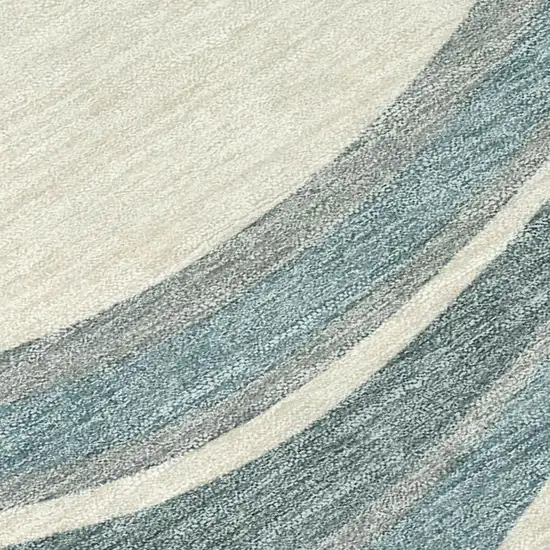 8' Teal Blue And Ivory Round Abstract Washable Indoor Outdoor Area Rug Photo 2