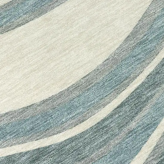 8' Teal Blue And Ivory Round Abstract Washable Indoor Outdoor Area Rug Photo 3