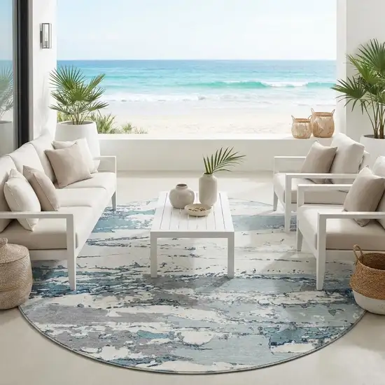 8' Teal Blue And Ivory Round Abstract Washable Indoor Outdoor Area Rug Photo 1