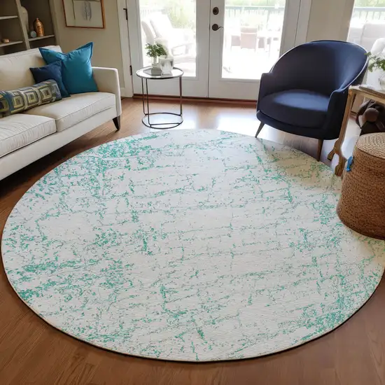 8' Teal Blue And Ivory Round Abstract Washable Indoor Outdoor Area Rug Photo 6