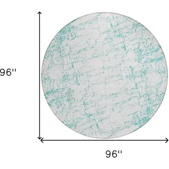 8' Teal Blue And Ivory Round Abstract Washable Indoor Outdoor Area Rug Photo 3