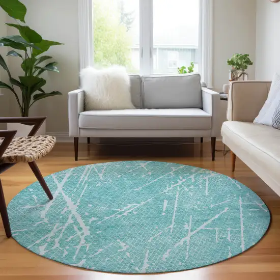 8' Teal Blue And Ivory Round Abstract Washable Indoor Outdoor Area Rug Photo 5