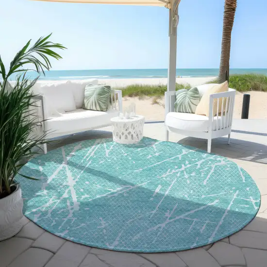 8' Teal Blue And Ivory Round Abstract Washable Indoor Outdoor Area Rug Photo 4