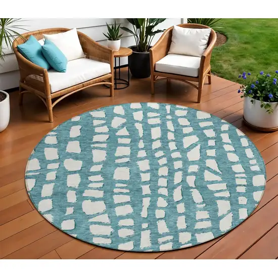 8' Teal Blue And Ivory Round Abstract Washable Indoor Outdoor Area Rug Photo 1