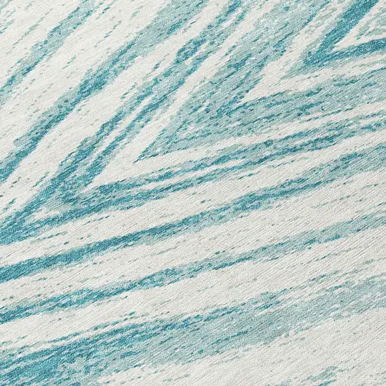 8' Teal Blue And Ivory Round Abstract Washable Indoor Outdoor Area Rug Photo 8