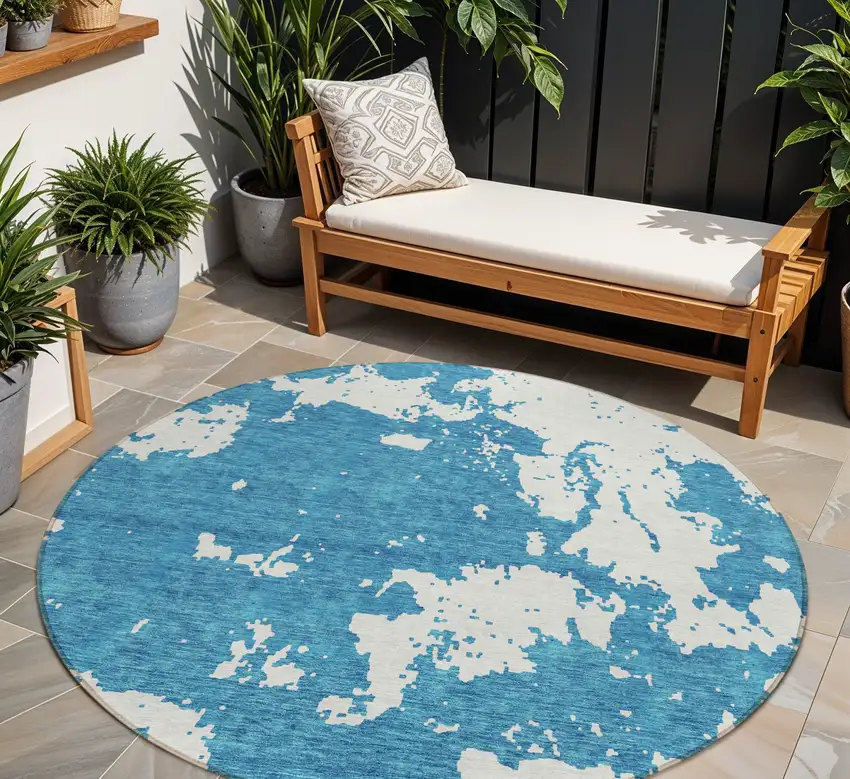 8' Teal Blue And Ivory Round Abstract Washable Indoor Outdoor Area Rug Photo 1