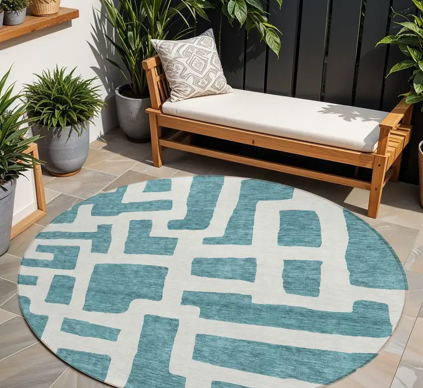 8' Teal Blue And Ivory Round Abstract Washable Indoor Outdoor Area Rug Photo 1