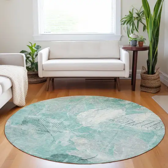 8' Teal Blue And Ivory Round Floral Washable Indoor Outdoor Area Rug Photo 6