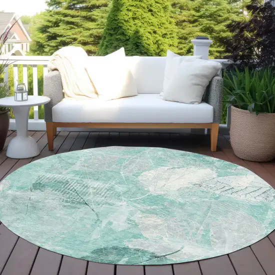 8' Teal Blue And Ivory Round Floral Washable Indoor Outdoor Area Rug Photo 5