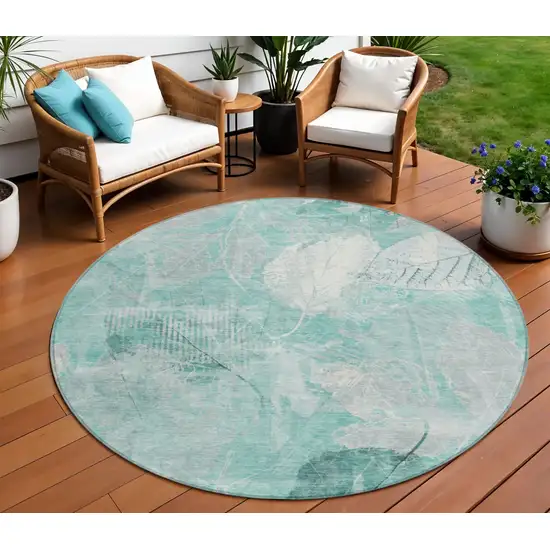 8' Teal Blue And Ivory Round Floral Washable Indoor Outdoor Area Rug Photo 2