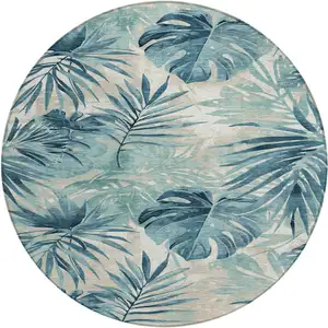 Photo of 8' Teal Blue And Ivory Round Floral Washable Indoor Outdoor Area Rug
