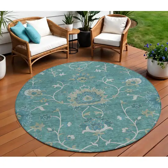 8' Teal Blue And Ivory Round Floral Washable Indoor Outdoor Area Rug Photo 1